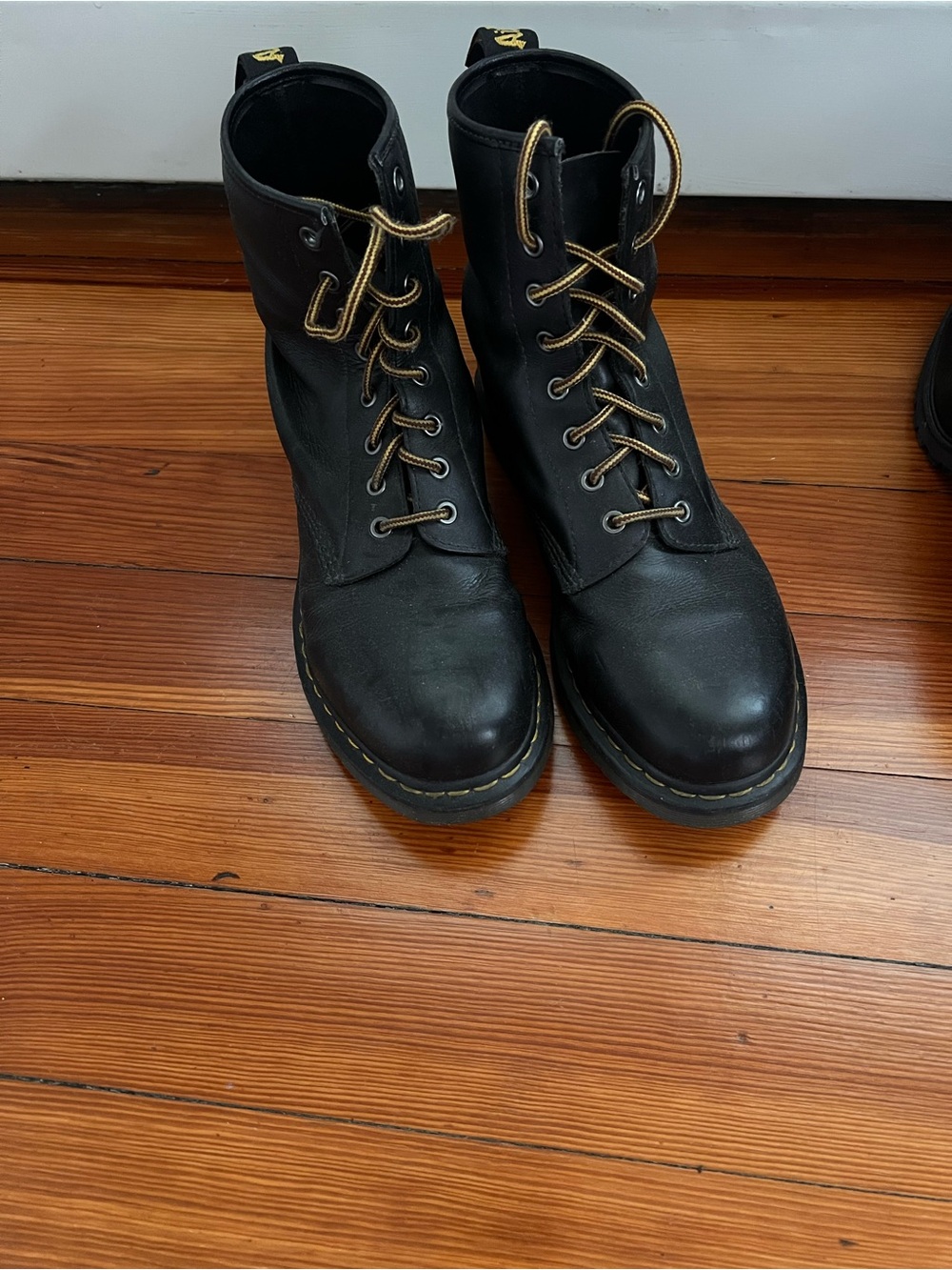 Dr. Martens Black Leather Combat Boots with Yellow Stitching